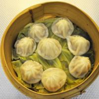 Steamed pork dumplings (8)   小籠包 · 