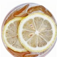 Honey Lemon Green Tea · Raw organic honey and fresh lemon slices