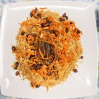 Kabuli Palow · A notable Afghan rice dish, brown rice with Lamb shank topped with carrots, raisins, and ALM...