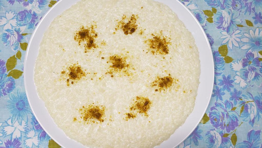 Milk Rice · A sweet, milk rice pudding. Topped with pistachio. Features cardamom and rose water.
ALLERGEN: PISTACHIO, MILK