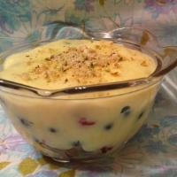 Fruit Custard · A fruit pudding made with strawberries, blueberries, raspberries, custard, milk, sugar, rose...
