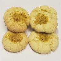 Rice Cookie · A sweet and crumbly cookie made with rice flour, topped with pistachios. Features semolina f...