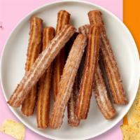 Churros · Mexican fried pastry with sugar and cinnamon.