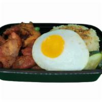 Tosilog · Sweet marinated pork with garlic topped  rice and sunny-side-up egg.