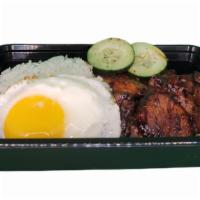 BBQ Chicken  silog · BBQ Bonesless Chicken thigh over  with garlic topped rice  and Sunny-side-up egg