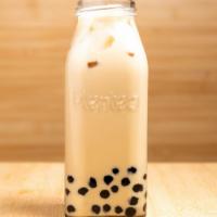Roast Oolong Milk Tea · Organic green oolong. Lightly roasted, nutty, with a smooth, mild finish.