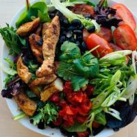 Fajitas Salad · Tomato, bell peppers, green onions, cilantro, and black beans.