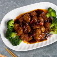 At Ease General Tso Chicken · Breaded chicken topped with house-made hot sauce served with veggies