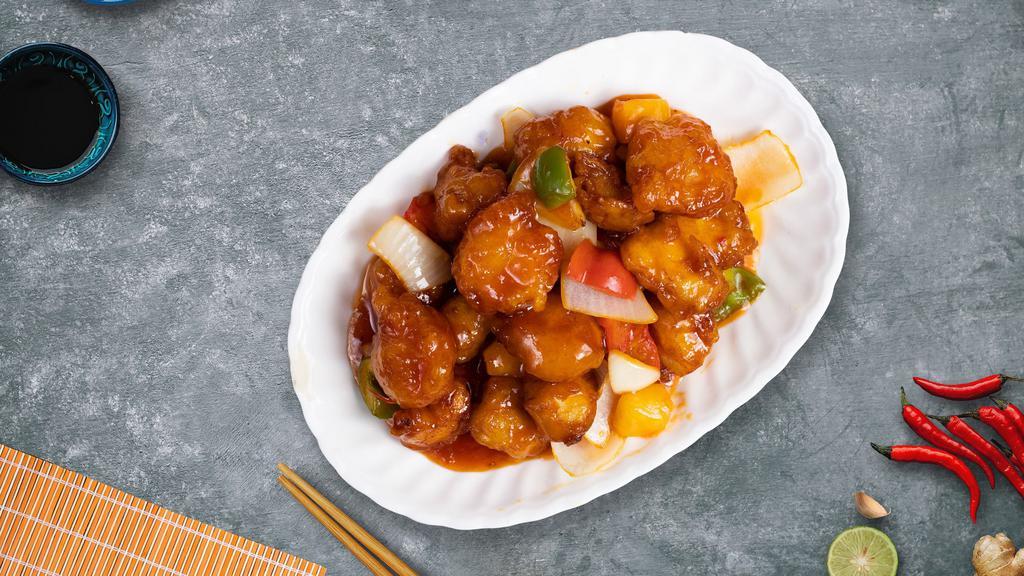 Sweet And Sour Pork Power · Pork with pineapples, bell peppers, and onions topped with housemade sweet and sour sauce