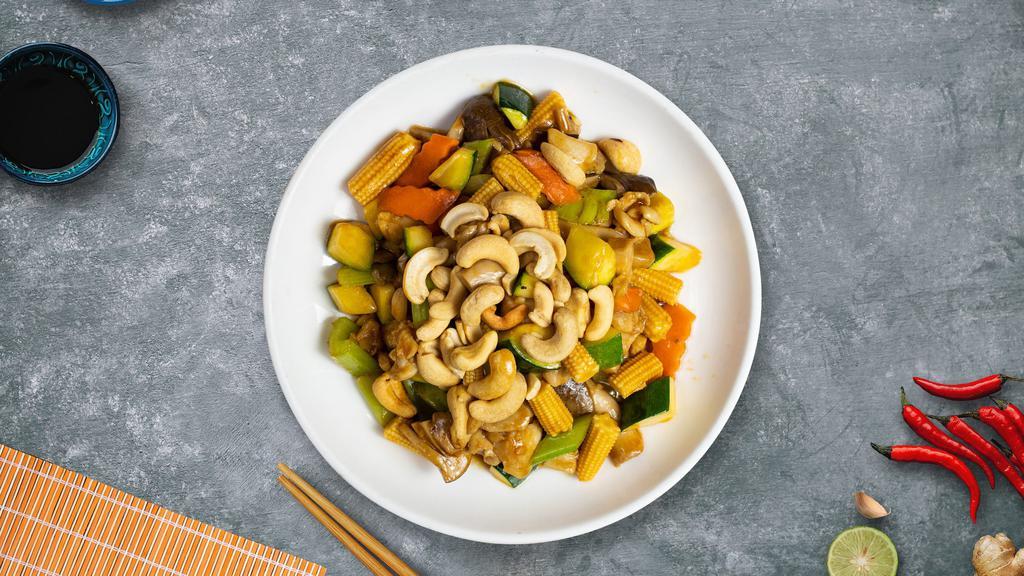 Cluckin' Cashew Me What You Got · Chicken stir-fried with celery, broccoli, snow peas, white mushrooms, carrots, water chestnuts, and cashews