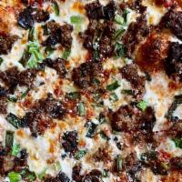 Piedmont Pizza · With hamburger and green onions.