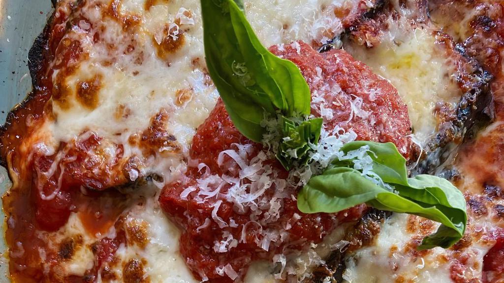 Eggplant Parmigiana · (Gluten Free) Baked non-breaded Eggplant Parmigiana.  A Lo Coco's staple...served with a piece of our homemade schiacciata bread.
