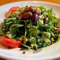 Servizio Di Sportivo · With arugula, pistachio, currants, crumbled blue cheese, and sicilian green olives. Served w...