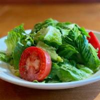 Green Salad · Served with extra virgin olive oil and vinegar dressing.