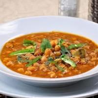 Chana Masala · Garbanzo beans cooked in a blend of spices.