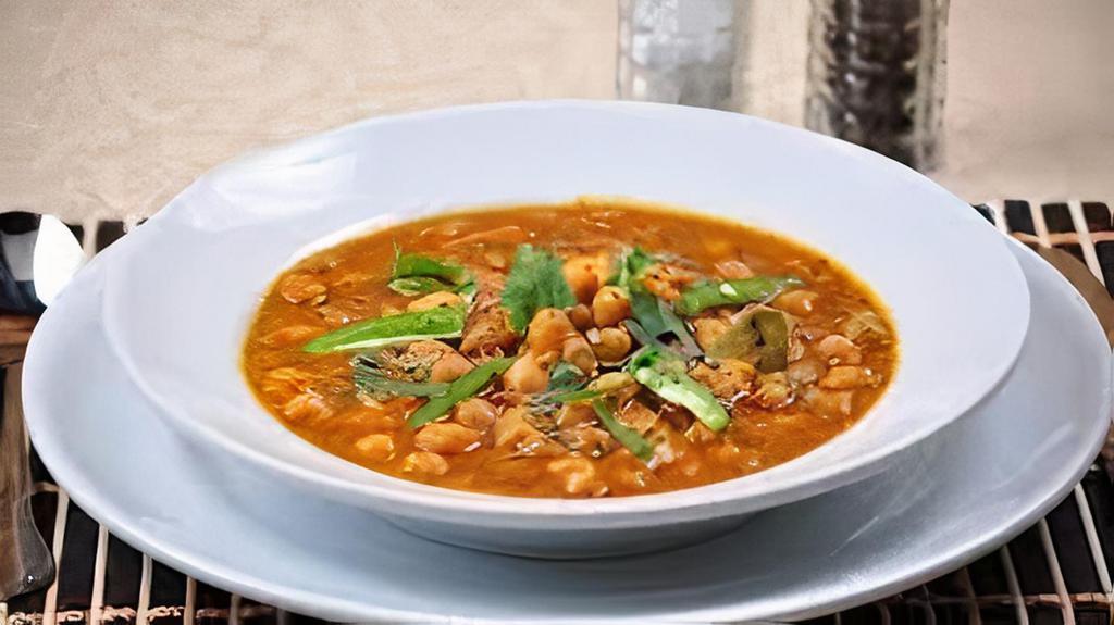 Chana Masala · Garbanzo beans cooked in a blend of spices.