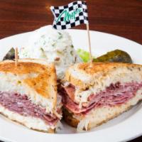 Max’s Classic Reuben · Corned beef, pastrami or combo, Swiss, sauerkraut, and 1000 island grilled on rye bread.