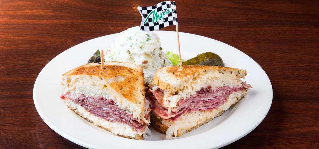 Max’s Classic Reuben · Corned beef, pastrami or combo, Swiss, sauerkraut, and 1000 island grilled on rye bread.