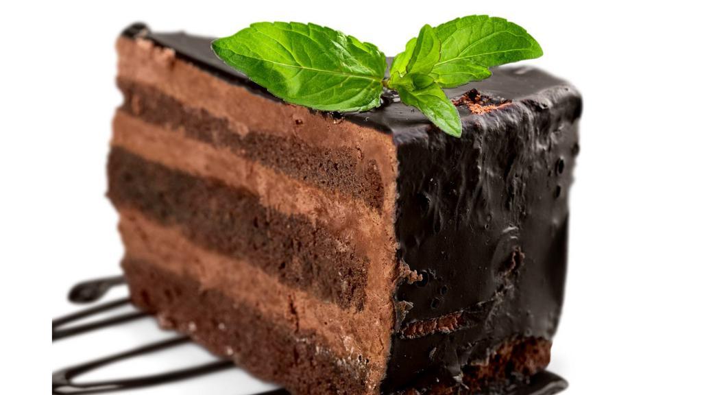 Ultimate Chocolate Cake · Layers of chocolate cake, bittersweet chocolate and fudge covered in chocolate ganache.