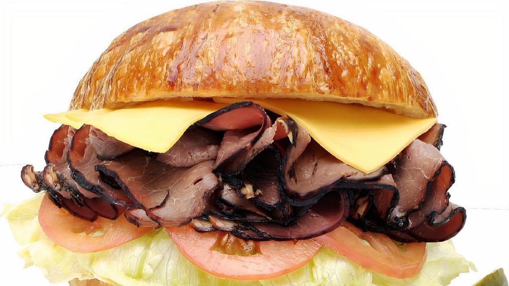 35. Roast Beef & Cheese  · Roast Beef, Lettuce, Tomato, Mayonnaise, cheese.
On the side: Pickle, Pepperoncini, Red Onion & Mustard.