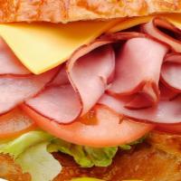 31. Ham & Cheese  · Ham, Lettuce, Tomato, Mayonnaise, cheese.
 On the side: Pickle, Pepperoncini, Red Onion & Mu...