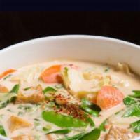Tom-Ka Thai Coconut Tofu Soup · Rice noodles, carrots, cabbage, snow peas, cilantro, galangal, chilies, onions and tofu in a...