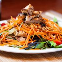 Thai-Chicken Salad · Chicken, mixed greens, cucumber, carrots, onions, bell peppers and peanuts. In a Citrus dres...