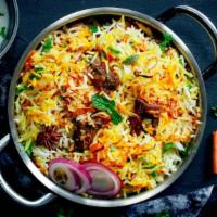 Lamb Biryani · Fresh basmati rice made with marinated lamb and various Indian herbs, spices and mint leaves.