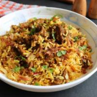Goat Biryani · Goat and rices cooked along with Indian spices.