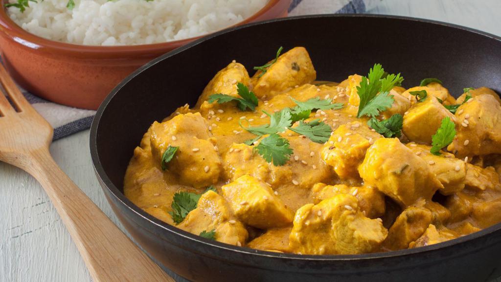 Chicken Curry · Fresh boneless chicken cooked in onions and chef's exquisite tomato sauce.