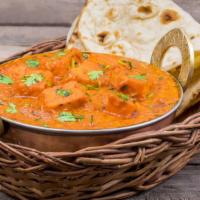 Paneer Tikka Masala · Vegetarian classic cubed cottage cheese with herbed creamy tomato sauce. Served with 8 oz. o...