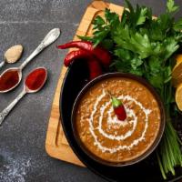 Dal Makhani · Fresh mixed lentils cooked in chef's special tomato sauce and Indian spices.