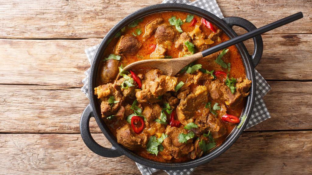 Kashmiri Lamb · Chef's cooked lamb in onions and chef's special tomato sauce and Indian spices.