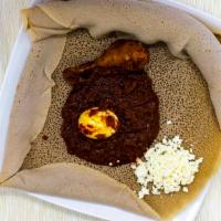 Doro Wot · Spicy Ethiopian chicken stew - cooked with onion, garlic, ginger, berbere, Ethiopian spiced ...