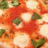 Pizza Margherita · Tomatoes, house made mozzarella, basil, olive oil. (Pizzas are not sliced. Add a pizza slice...