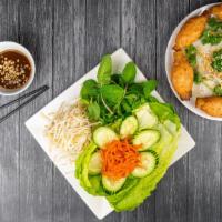 70. Bánh hỏi chạo tôm · woven fine rice vermicelli with shrimp surimi grilled on a sugar cane stick & lettuce wrap. ...