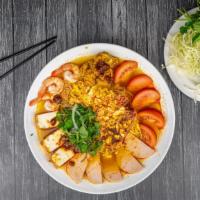 5. Bún riêu / Crab noodle soup  · (Large)  with crab meat sauce, tomato, fish cake, shrimp, pork blood, tofu, & vermicelli noo...