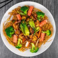 68. Mì xào dòn hải sản / Seafood crispy noodle · Sautéed shrimp, imitation crab, squid, fish ball, & mix vegetables over crispy noodle