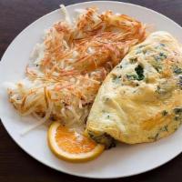 Veggie Omelet · A three egg omelet, we blend tomatoes, onions, bell Peppers, mushrooms and Spinach. Served w...