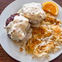 Country Benedict · A Buttermilk biscuit, sausage patties, the we add two poached eggs and homemade gravy on top...