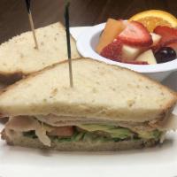 Turkey Avocado Sandwich · This is a Cold sandwich.  Sliced turkey breast, Avocado slices, lettuce and tomatoes on Whea...