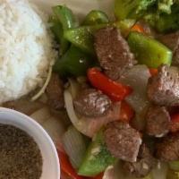 D15. Shaking Cube Beef / Bò Lúc Lắc · Sizzling filet mignon steak (8 ounces), onions, bell peppers in garlic oyster sauce. Served ...