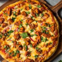 Spicy Chicken Indian Pizza · Creamy delicious tandoor garlic sauce with juicy chicken, six cheeses, bell peppers, red oni...