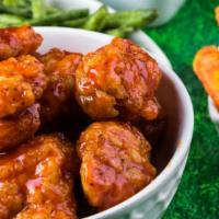 Roasted Traditional Wings · Delicious cooked wings coated in roasted sauce and Seasoned to perfection.