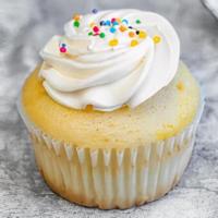 Vanilla (Regular Size) · Vanilla cake topped with vanilla buttercream frosting and garnished with colorful sprinkles.