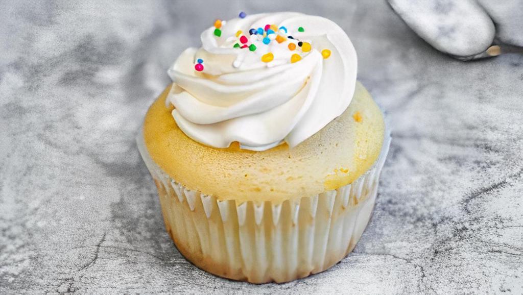 Vanilla (Regular Size) · Vanilla cake topped with vanilla buttercream frosting and garnished with colorful sprinkles.