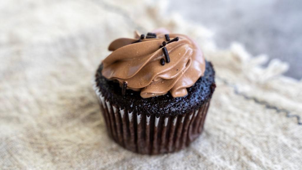 Double Chocolate (Mini Size) · Chocolate cake frosted with chocolate buttercream, and garnished with chocolate flakes.
