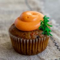 Carrot (Mini Size) · Carrot cake topped with sweet cream cheese and garnished with shredded coconut.