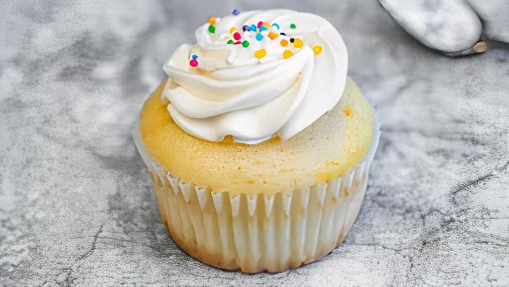 Vanilla (Mini Size) · Vanilla cake topped with vanilla buttercream frosting and garnished with colorful sprinkles.