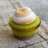 Key Lime (Mini Size) · Lime Cupcake with a Graham Cracker Crust, filled with Lime Curd, and topped with toasted Mer...
